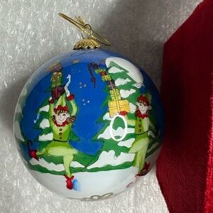 Pier 1 Li Bien hand-painted ornament, featuring elves and a sleigh.